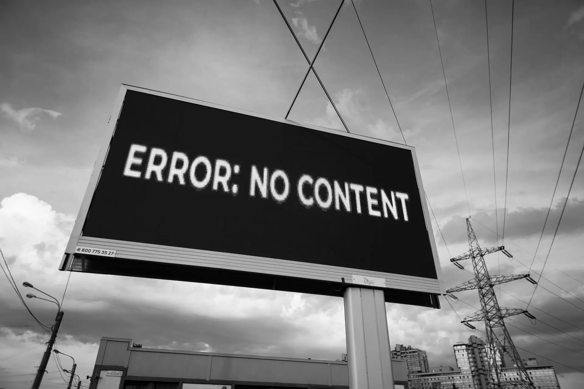 Large sign with the words "Error: No Content" against a dark forbidding sky