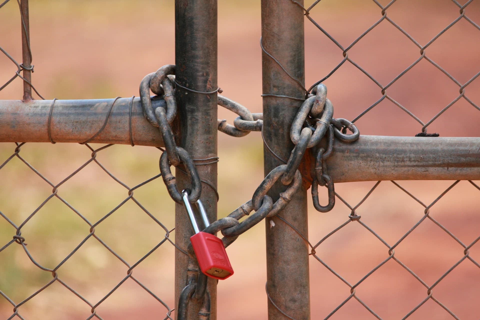 A gate that is chained in the shape of a heart